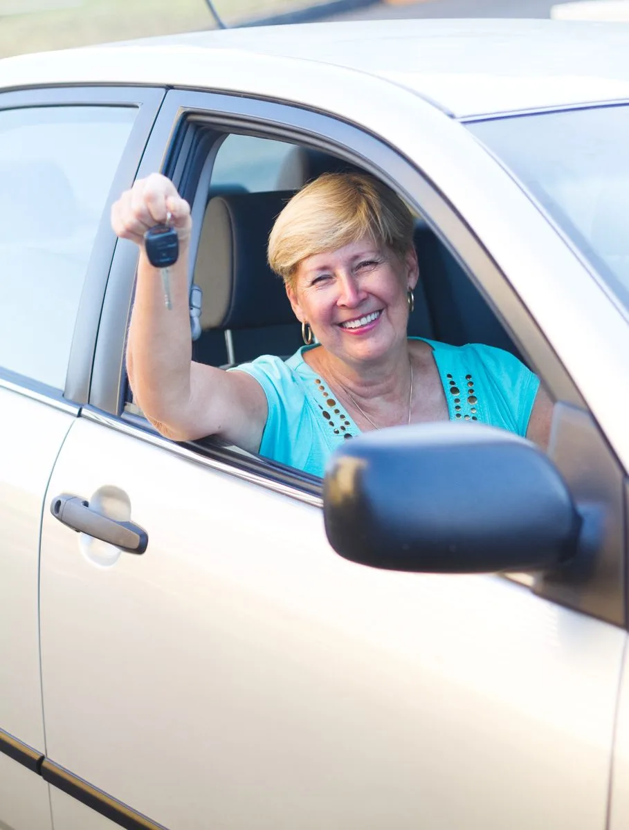 Driving instructor explaining road rules to student at Edmonton driving school